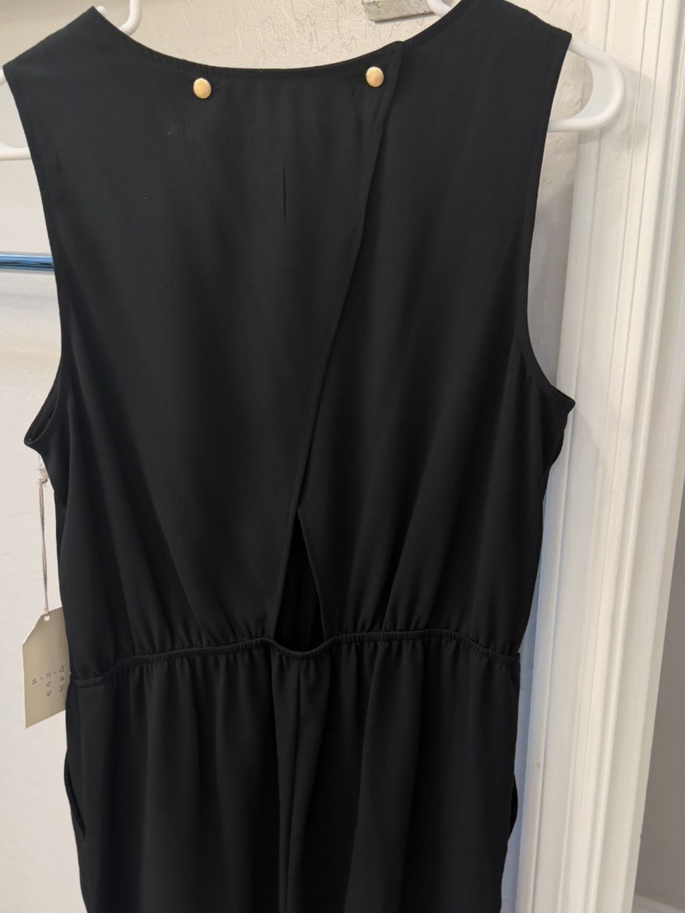 Trindy Clozet Boutique Black Sleeveless Mini Dress with Gold Button Detail